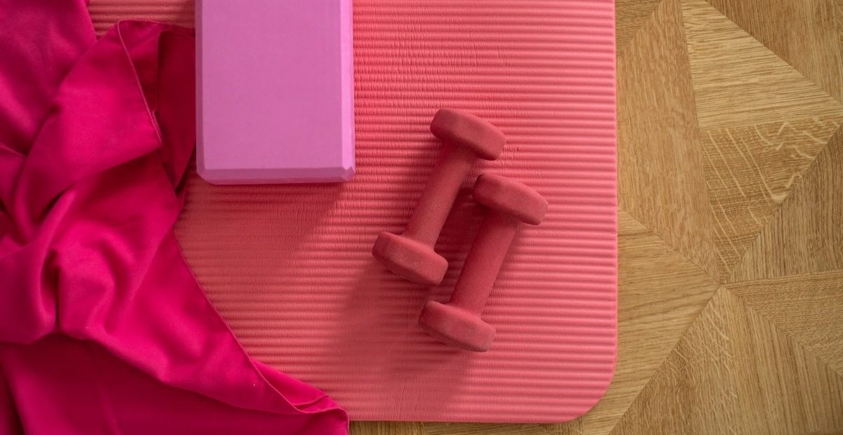 pink exercise mat with weights