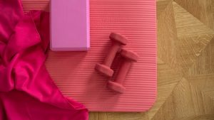 pink exercise mat with weights